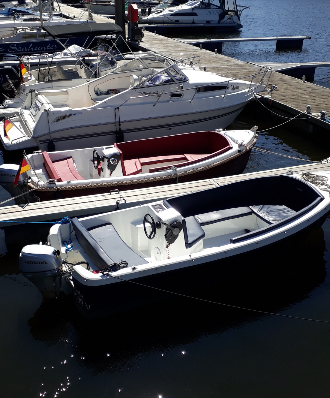 The motorboats of Hansa-Charter Motorbootvermietung are moored in the Europahafen marina.