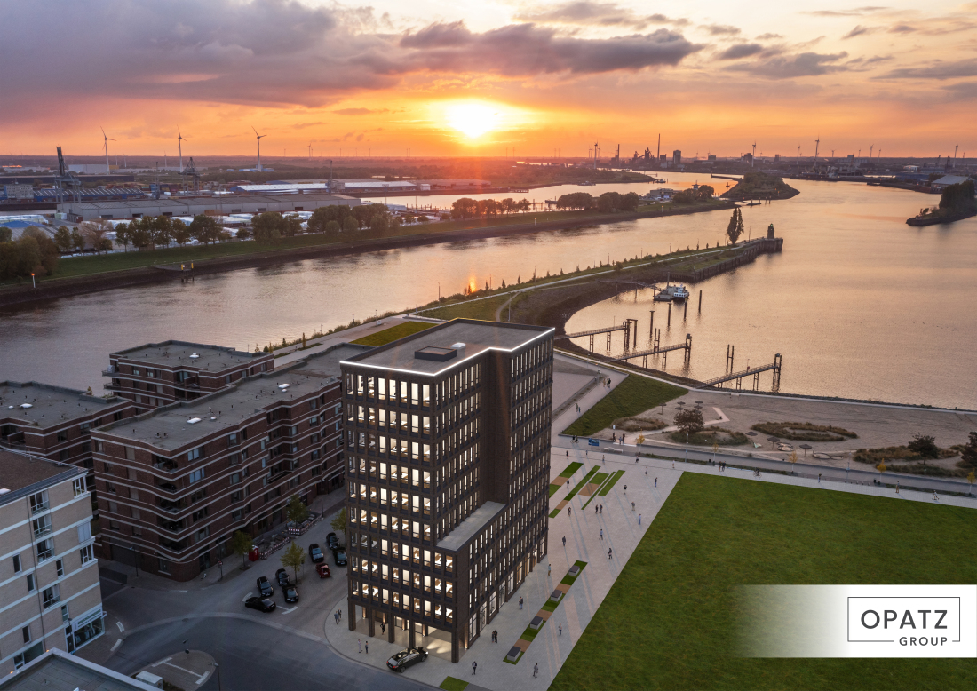 Das Bürogebäude VIEW aus der Vogelperspektive mit dem Waller Sand und der Abendsonne im Hintergrund. 